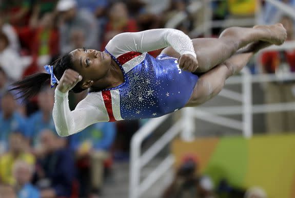 United States' Simone Biles performs on the vault during the artistic gymnastics women's individual all-around final at the 2016 Summer Olympics in Rio de Janeiro, Brazil, Thursday, Aug. 11, 2016. (AP Photo/David Goldman)