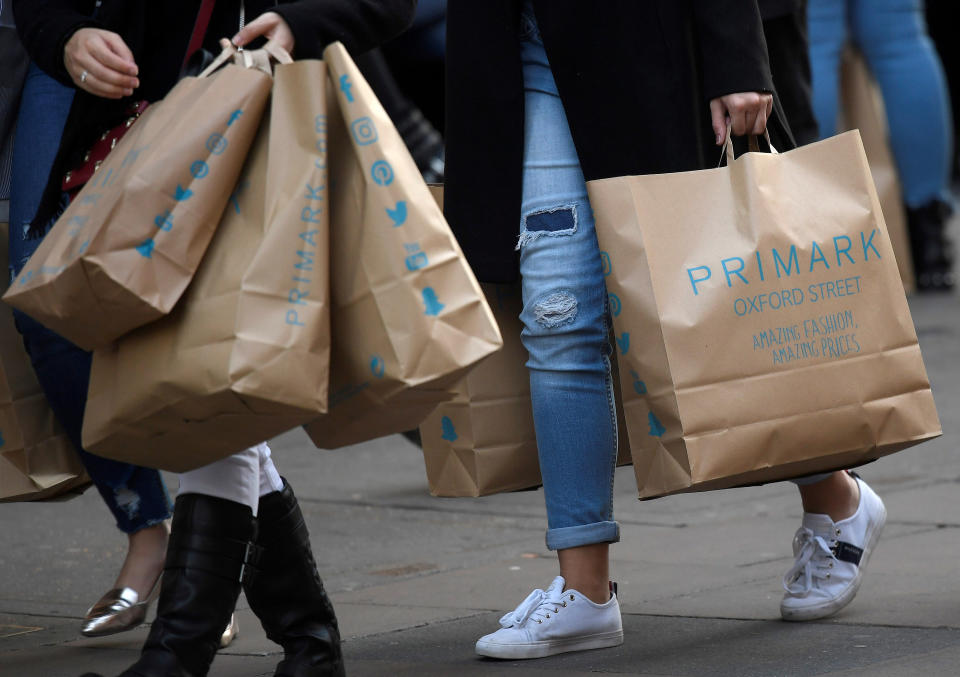 Shoppers carry Primark bags in central London, Britain, November 3, 2017. Picture taken November 3, 2017. REUTERS/Toby Melville