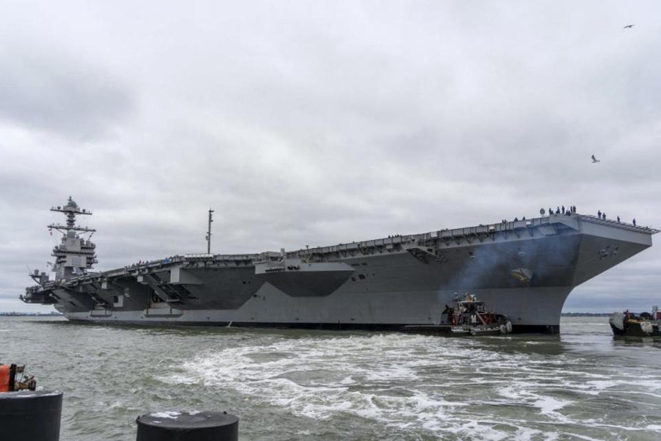This handout photo provided by the US Navy shows the USS Gerald R. Ford-class aircraft carrier USS Gerald R. Ford (CVN 78) departing Naval Station Norfolk, Virginia on October 4, 2022 (US NAVY/AFP via Getty Images)