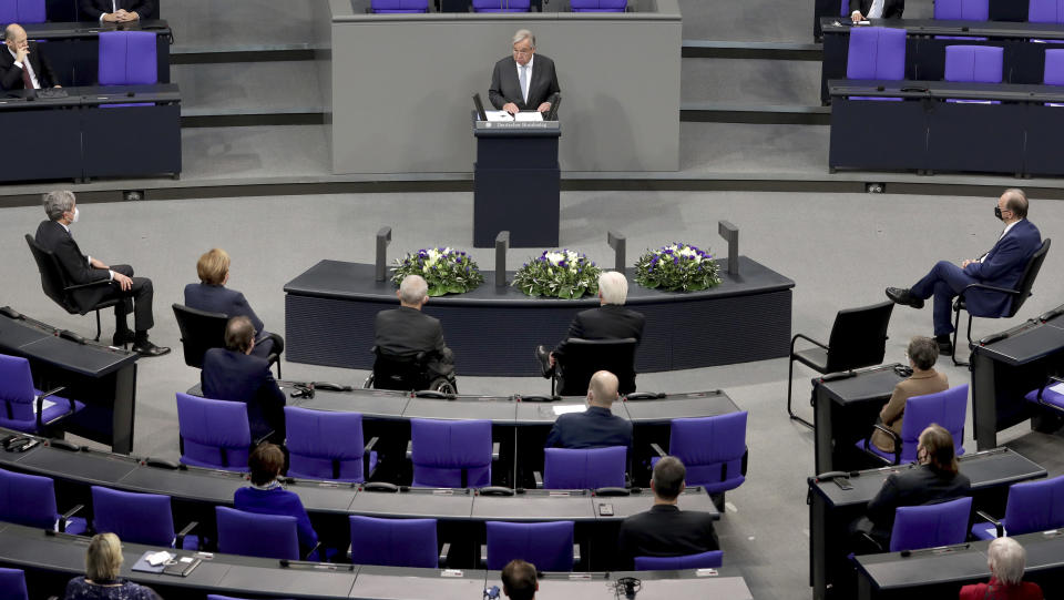 UN Secretary-General Antonio Guterres delivers a speech during a meeting of the German federal parliament, Bundestag, at the Reichstag building in Berlin, Germany, Friday, Dec. 18, 2020. (AP Photo/Michael Sohn)