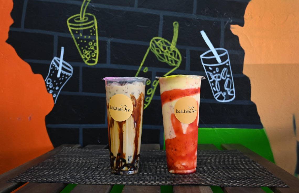 Handcrafted boba-style drinks from bubble Bee include a rocking cream caramel, left, and sizzling mango photographed in the space they share with The Curry Life Indian food and Spicy Birdz in the Bluff View shopping center at Herndon and West in Fresno on Wednesday, Feb. 15, 2023.