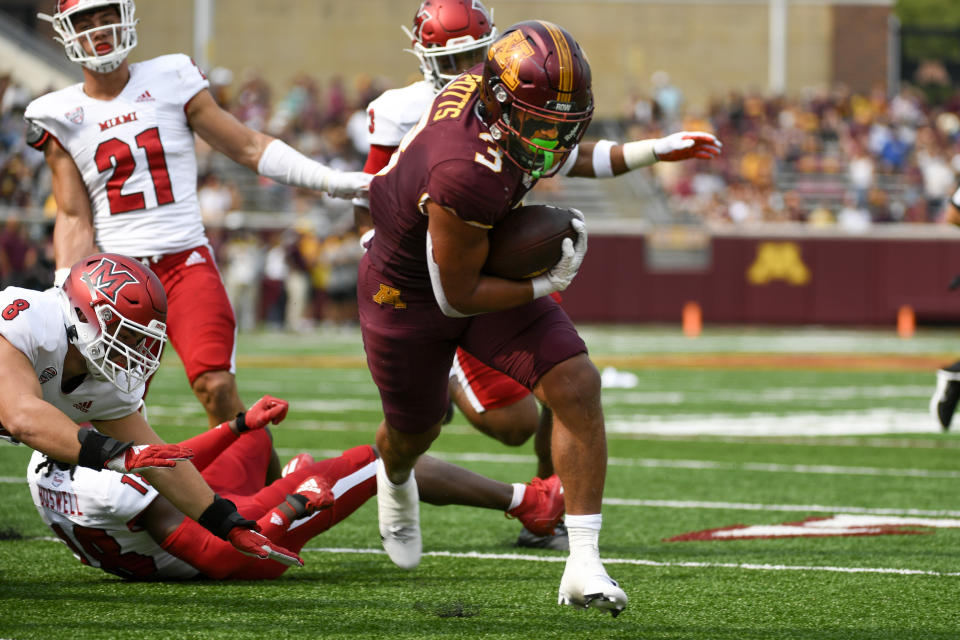 Minnesota running back Trey Potts scores a touchdown on a four yard run against Miami Ohio during the first half of an NCAA college football game on Saturday, Sept. 11, 2021, in Minneapolis. (AP Photo/Craig Lassig)