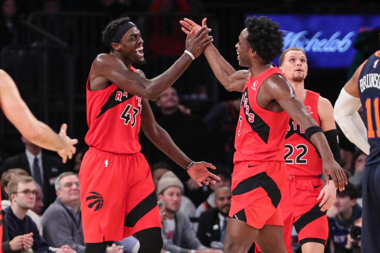 Toronto Raptors forward Pascal Siakam (43) celebrates after scoring with forward O.G. Anunoby (3) in the fourth quarter against the New York Knicks in New York at Madison Square Garden, Dec. 21, 2022.