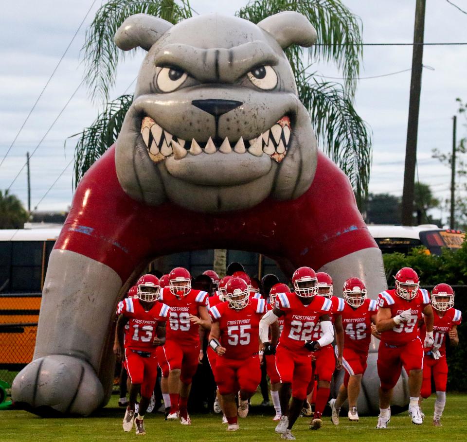 The Frostproof football players run on to the field to play Lakeland Christian on Friday night at Faris Brannen Stadium.