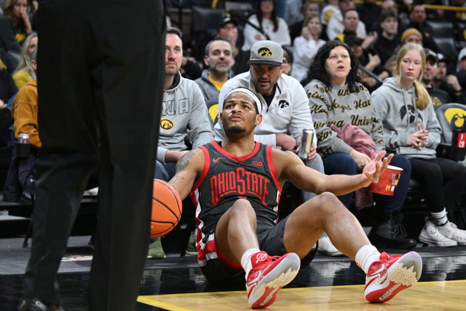 Feb 16, 2023; Iowa City, Iowa, USA; Ohio State Buckeyes guard Roddy Gayle Jr. (1) reacts with an official as fans look on during the first half against the Iowa Hawkeyes at Carver-Hawkeye Arena. Mandatory Credit: Jeffrey Becker-USA TODAY Sports
