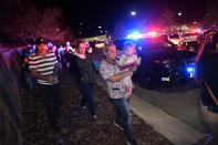 <p>Walmart employees and customers head away from the scene outside of the Walmart store where a shooting occurred inside the store at 9901 Grant Street on Nov. 1, 2017 in Thornton, Colo. (Photo: Helen H. Richardson/The Denver Post via Getty Images) </p>