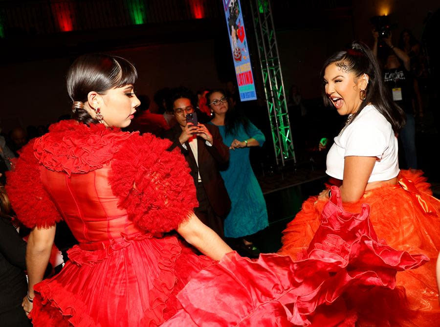 Xochitl Gomez (Left) and Annie Gonzalez dance up a storm at the opening night gala of the LALIFF 2023 Opening Night premiere of “Flamin’ Hot” held at TCL Chinese Theatre Hollywood. (Michael Tran/LALIFF)