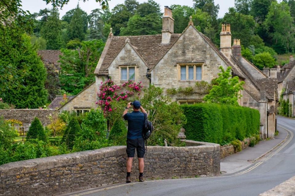 Every year, tourists flock to Castle Combe in their thousands (SWNS)