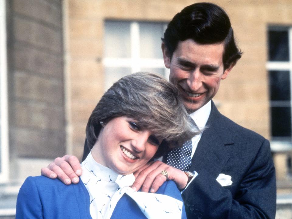 Prince Charles and Lady Diana Spencer pose outside Buckingham Palace following the official announcement of their engagement in 1981.