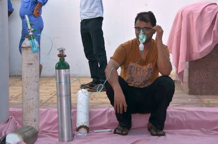 A man receives treatment at Jazan General Hospital following a pre-dawn fire in the port city of Jazan, Saudi Arabia December 24, 2015. REUTERS/Saudi Civil Defense/Handout via Reuters