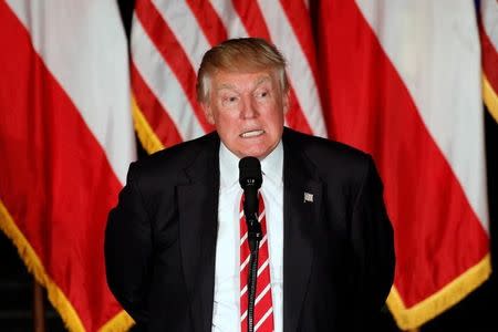 Republican presidential candidate Donald Trump addresses an audience at The Fox Theatre in Atlanta, Georgia, June 15, 2016. REUTERS/Chris Aluka Berry