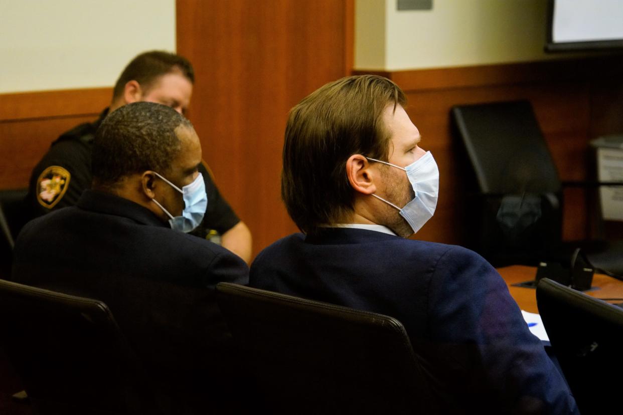 David A. Reid, 54, left, appears March 21 with Vincent Watkins, one of his Franklin County public defense attorneys, during his trial in Franklin County Common Pleas Court. A jury on Monday agreed with Reid's claims of self-defense and found him not guilty of murder charges in the 2020 beating death of 55-year-old Marcus Ware.