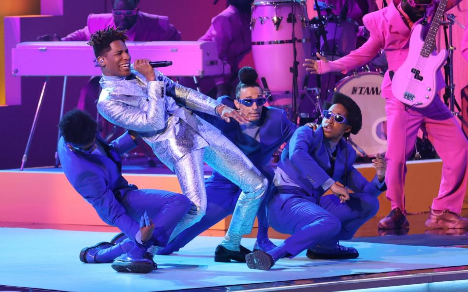 Jon Batiste performs onstage at the 64th Annual Grammy Awards held at the MGM Grand Garden Arena