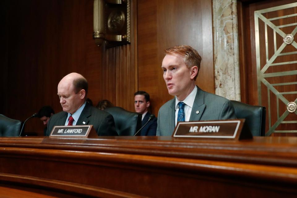 Sen. James Lankford (R-Okla.) is pictured with Sen. Chris Coons (D-Del.) left, at a hearing on Capitol Hill in May 2018.