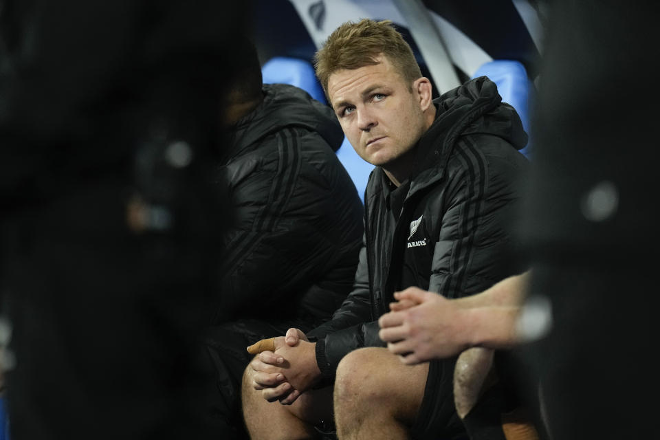 FILE - All Blacks captain Sam Cane sits on the bench after he was sent off in the Rugby World Cup final between New Zealand and South Africa at the Stade de France in Saint-Denis, near Paris Saturday, Oct. 28, 2023. Cane announced Monday, May 13, 2024 that he was retiring from international rugby at the end of the 2024 season. (AP Photo/Christophe Ena, File)