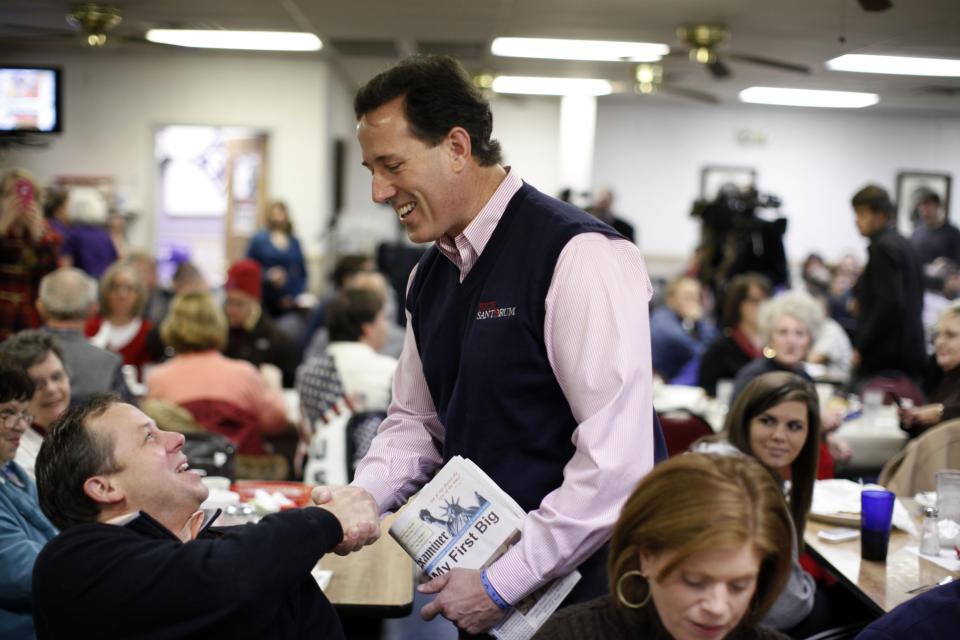 FILE -In this Saturday, Jan. 14, 2012 file photo, Republican presidential candidate, former Pennsylvania Sen. Rick Santorum, meets patrons of Tommy's Ham House during a campaign event in Greenville, S.C. The Greenville landmark says it is turning off the fryer and shutting its doors. Owner Tommy Stevenson announced Sunday that Tommy's Country Ham House would close this spring. (AP Photo/Matt Rourke, File)