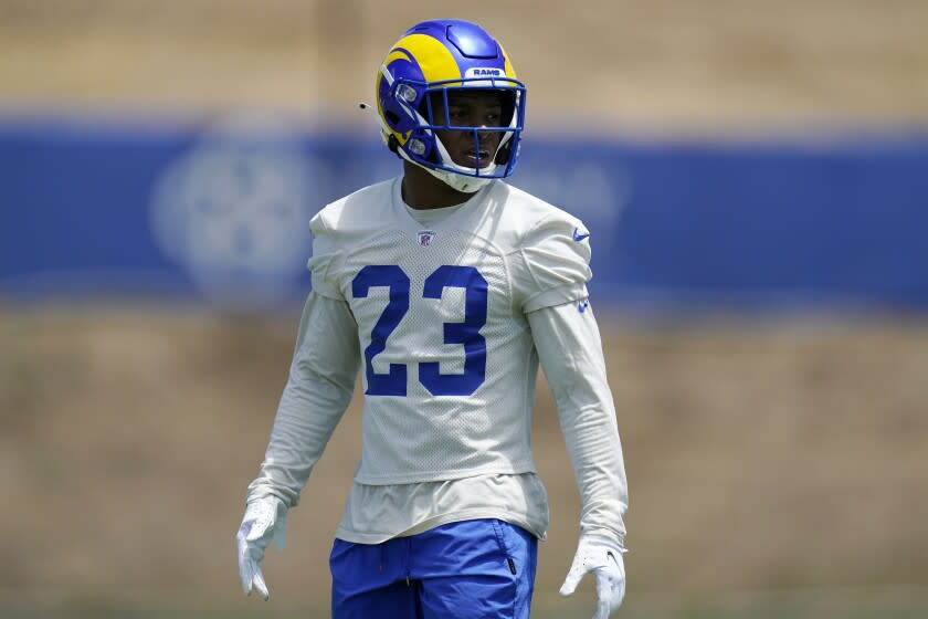 Los Angeles Rams running back Cam Akers stands on the field during an NFL football practice Tuesday, June 8, 2021, in Thousand Oaks, Calif. (AP Photo/Mark J. Terrill)