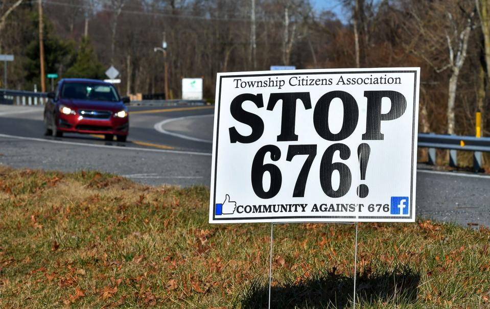 Signs in residents yards opposing the 33 apartment buildings containing 676 units proposed in the Guilford Hills area east of Chambersburg.