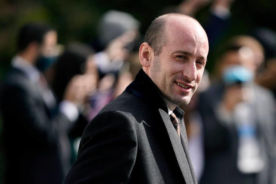 FILE - In this Oct. 30, 2020 file photo, President Donald Trump’s White House Senior Adviser Stephen Miller follows President Donald Trump on the South Lawn of the White House in Washington. (AP Photo/Patrick Semansky, File)