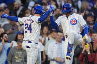Chicago Cubs' Cody Bellinger, left, and Christopher Morel celebrate Bellinger's home run against the San Diego Padres during the fourth inning of a baseball game Tuesday, May 7, 2024, in Chicago. (AP Photo/Erin Hooley)