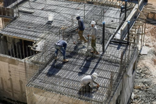 Palestinian labourers are responsible for building many of the houses in Israeli settlements, such as here in Kerem Reim in the West Bank