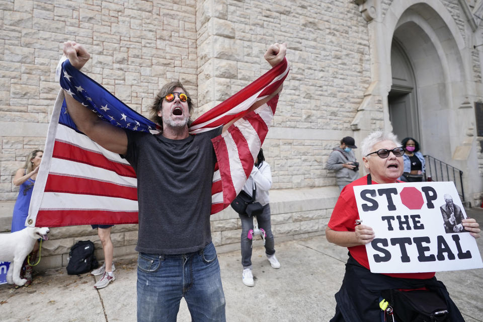 Supporters of President Donald Trump protest near the state capitol, Saturday, Nov. 7, 2020 in Atlanta. Democrat Joe Biden defeated President Donald Trump to become the 46th president of the United States positioning himself to lead a nation gripped by the historic pandemic and a confluence of economic and social turmoil. (AP Photo/John Bazemore)