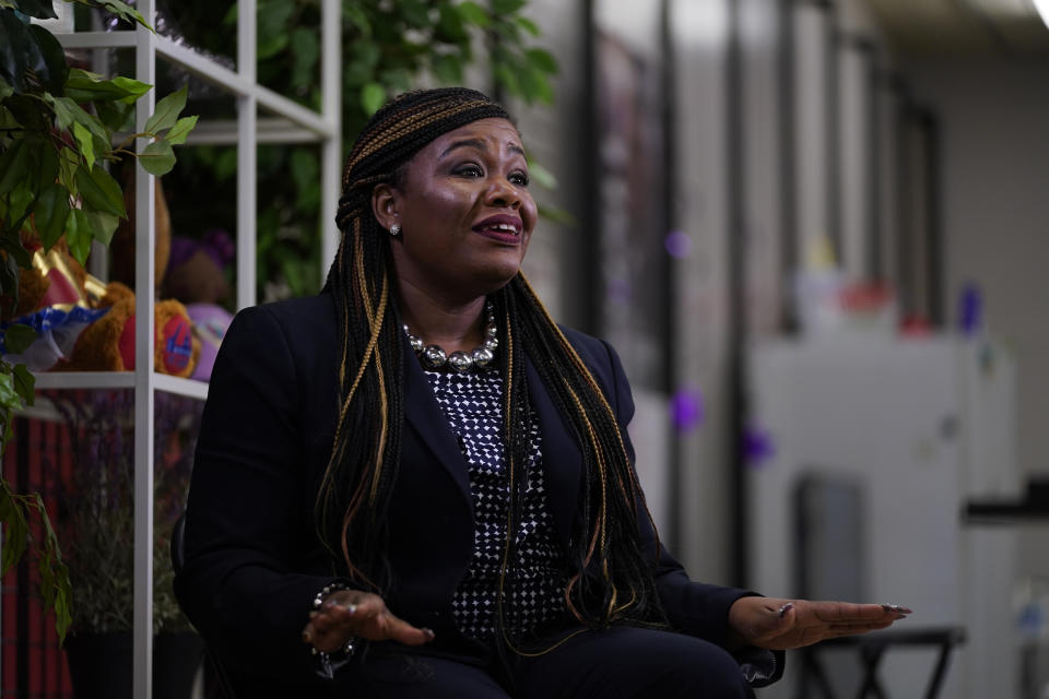 FILE - U.S. Rep. Cori Bush, D-Mo., speaks during an interview Friday, Nov. 12, 2021, in Northwoods, Mo. Rep. Bush claims on social media that white supremacists shot at protesters in Ferguson, Missouri, in 2014, but the city’s police chief says he was unaware of any such incident. She posted on Twitter and Facebook on Monday, Nov. 15, 2021 that during the protests following Brown's death, “white supremacists would hide behind a hill near where Michael Brown Jr. was murdered and shoot at us.” Many people responded by questioning if that really happened. (AP Photo/Jeff Roberson)