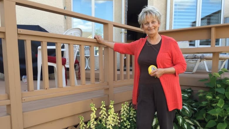 Woman, 78, says City of Winnipeg bullying her over backyard deck