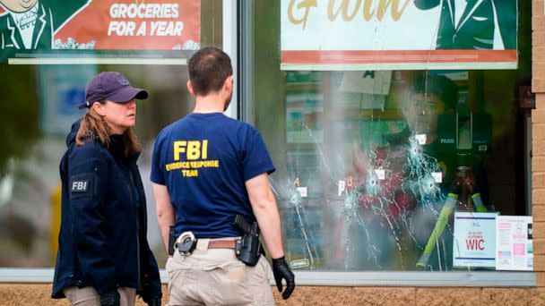 PHOTO: Investigators work the scene of a mass shooting at Tops supermarket in Buffalo, N.Y., Monday, May 16, 2022. (Matt Rourke/AP)