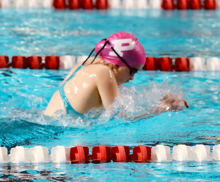 Sophia McDevitt competes in the 200 Individual Medley
during the Greater Iowa Swim League State Swim Meet on Saturday, March 11 in downtown Des Moines.