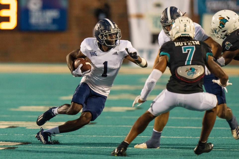 Georgia Southern Eagles wide receiver Jeremy Singleton (1) runs the ball in the first quarter against the Coastal Carolina Chanticleers on Saturday night at Brooks Stadium. CCU won 34-30.