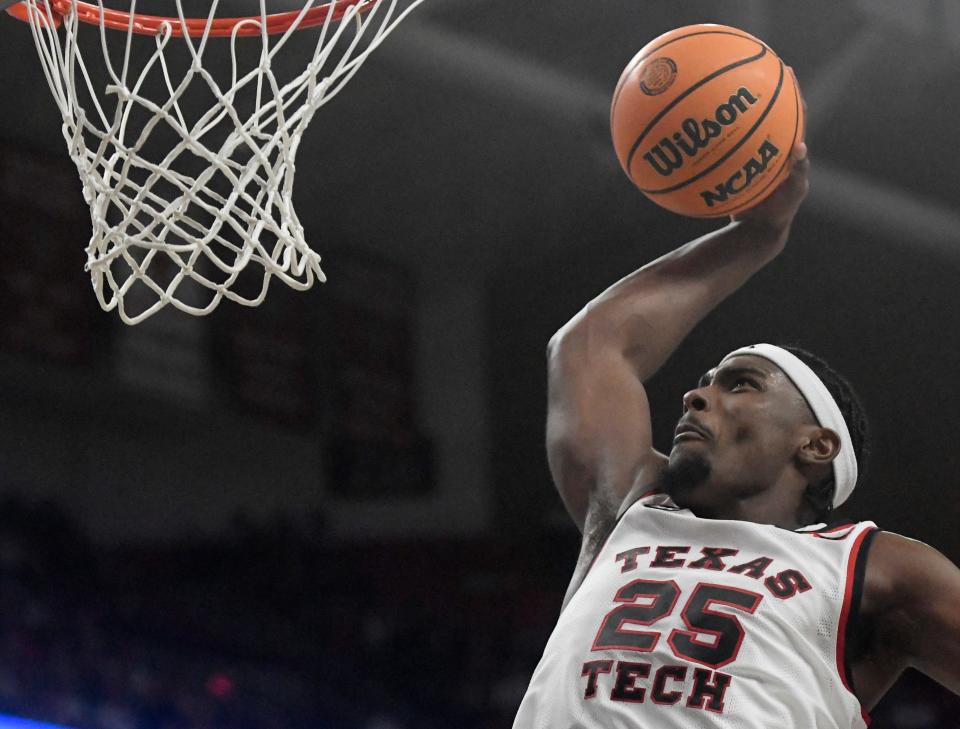 Texas Tech's forward Robert Jennings (25) prepares to dunk the ball against Kansas in a Big 12 basketball game, Monday, Feb. 12, 2024, at United Supermarkets Arena.