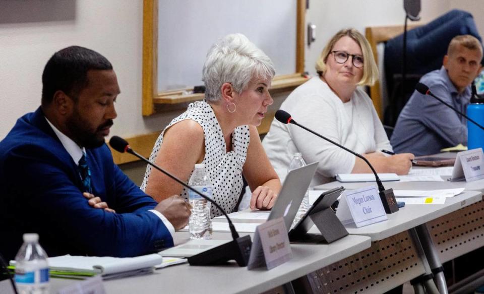 Meridian Library District’s board of trustees chair Megan Larsen addresses a large audience before a long list of public commenters took turns at the podium on Wednesday, Aug. 17, 2022. Sarah A. Miller/smiller@idahostatesman.com