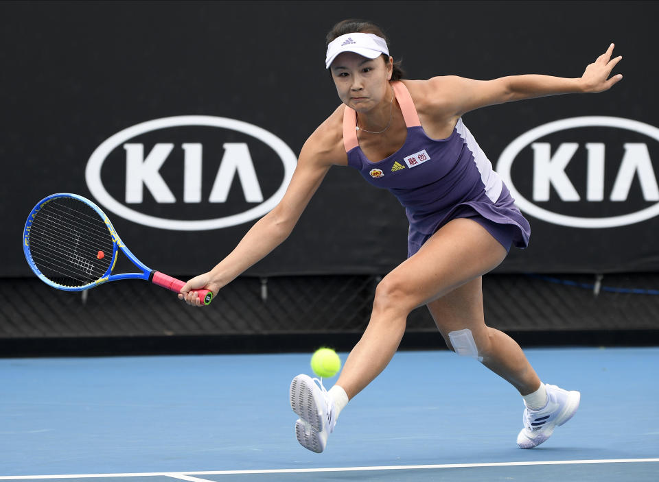 FILE - China's Peng Shuai makes a forehand return to Japan's Nao Hibino during their first round singles match at the Australian Open tennis championship in Melbourne, Australia, Tuesday, Jan. 21, 2020. (AP Photo/Andy Brownbill, File)