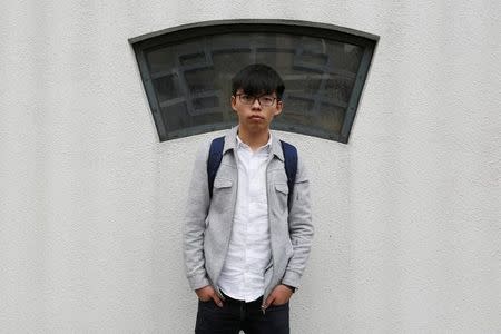 FILE PHOTO: Pro-democracy student leader Joshua Wong, 20, poses near his home in Hong Kong, China March 31, 2017. REUTERS/Bobby Yip/File Photo