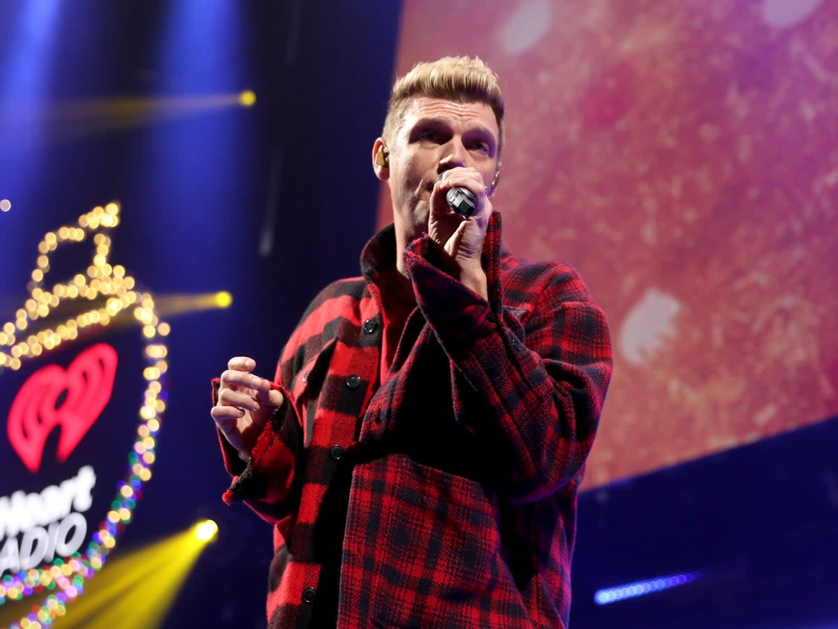 Carter on stage in December  (Getty Images for iHeartRadio)
