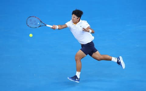 Hyeon Chung of South Korea plays a forehand in his fourth round match against Novak Djokovic of Serbia on day eight of the 2018 Australian Open at Melbourne Park on January 22, 2018 in Melbourne, Australia