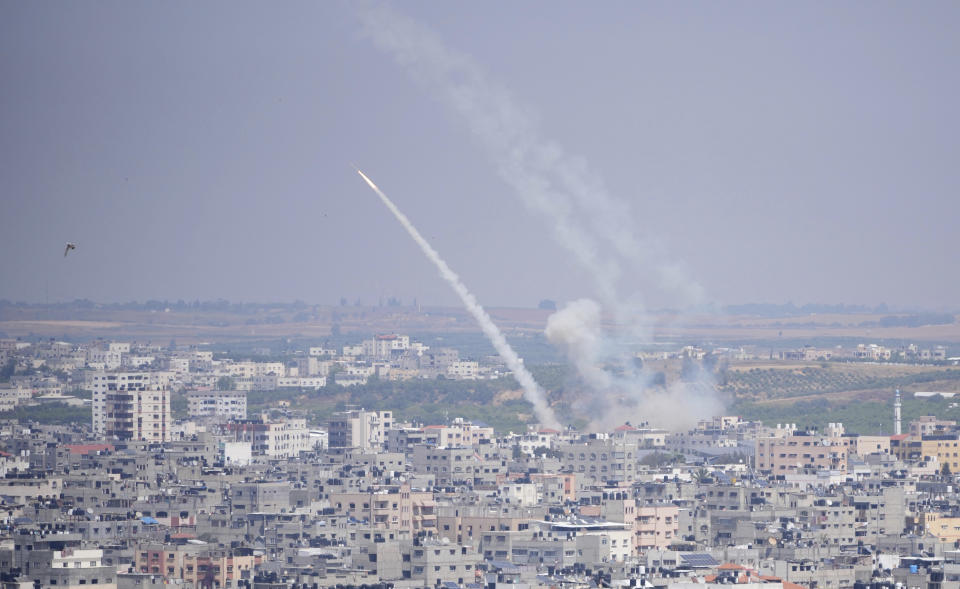 Rockets are launched from the Gaza Strip towards Israel, in Gaza City, Wednesday, May 10, 2023. Israeli aircraft struck targets in the Gaza Strip for a second straight day on Wednesday, killing at least one Palestinian and pushing the region closer toward a new round of heavy fighting. (AP Photo/Hatem Moussa)