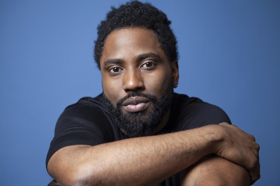 FILE - In this Nov. 14, 2018 photo, actor John David Washington poses for a portrait at the Four Seasons Hotel in Los Angeles. Washington stars in the Christopher Nolan film "Tenet." (Photo by Rebecca Cabage/Invision/AP, File)