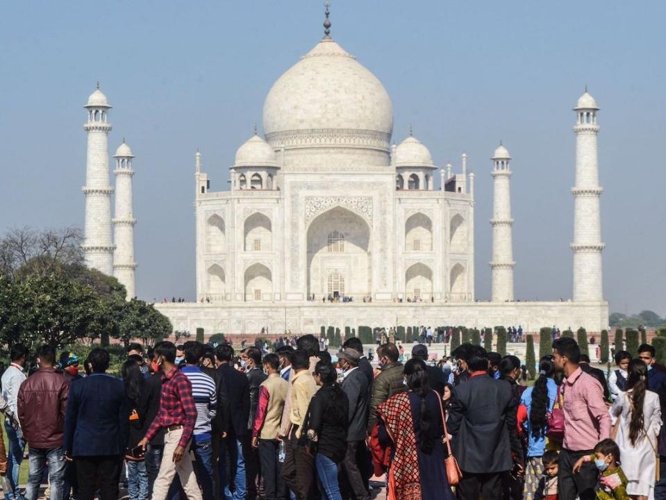 Tourists visit the Taj Mahal in Agra on December 19, 2020.