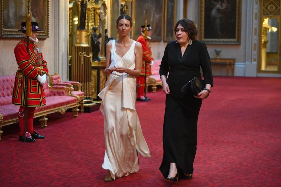 Rose Hanbury (left) and Daily Mail columnist Sarah Vine arrive at the State Banquet at Buckingham Palace, London, on day one of US President Donald Trump's three day state visit to the UK in 2019 (PA)