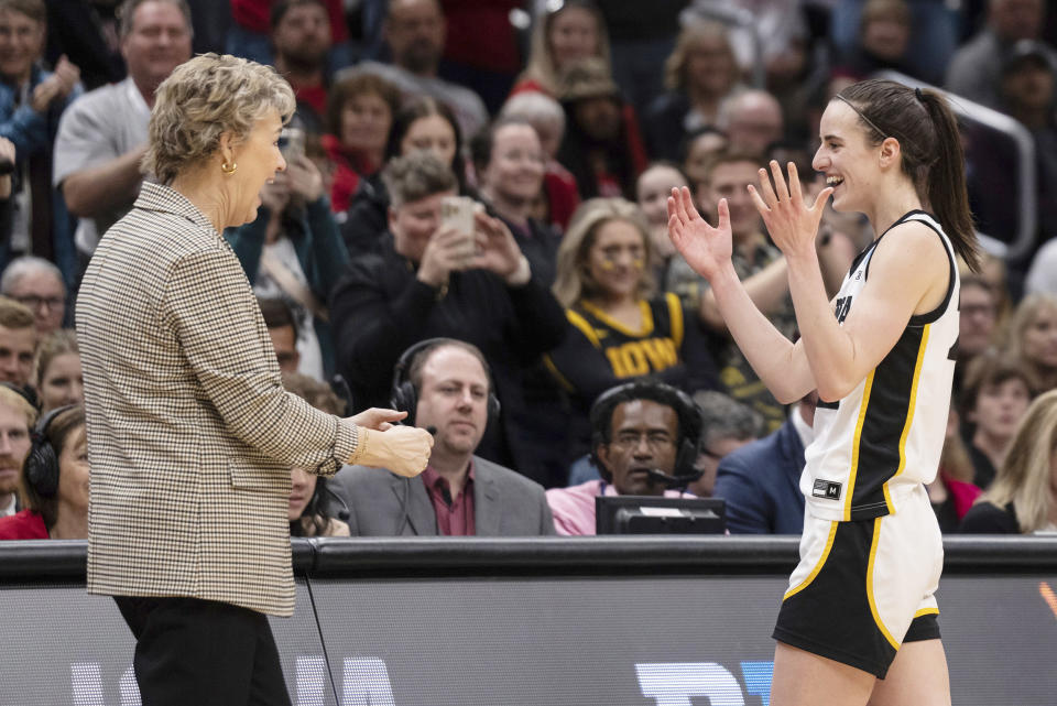 Caitlin Clark and Iowa coach Lisa Bluder (Stephen Brashear / AP)