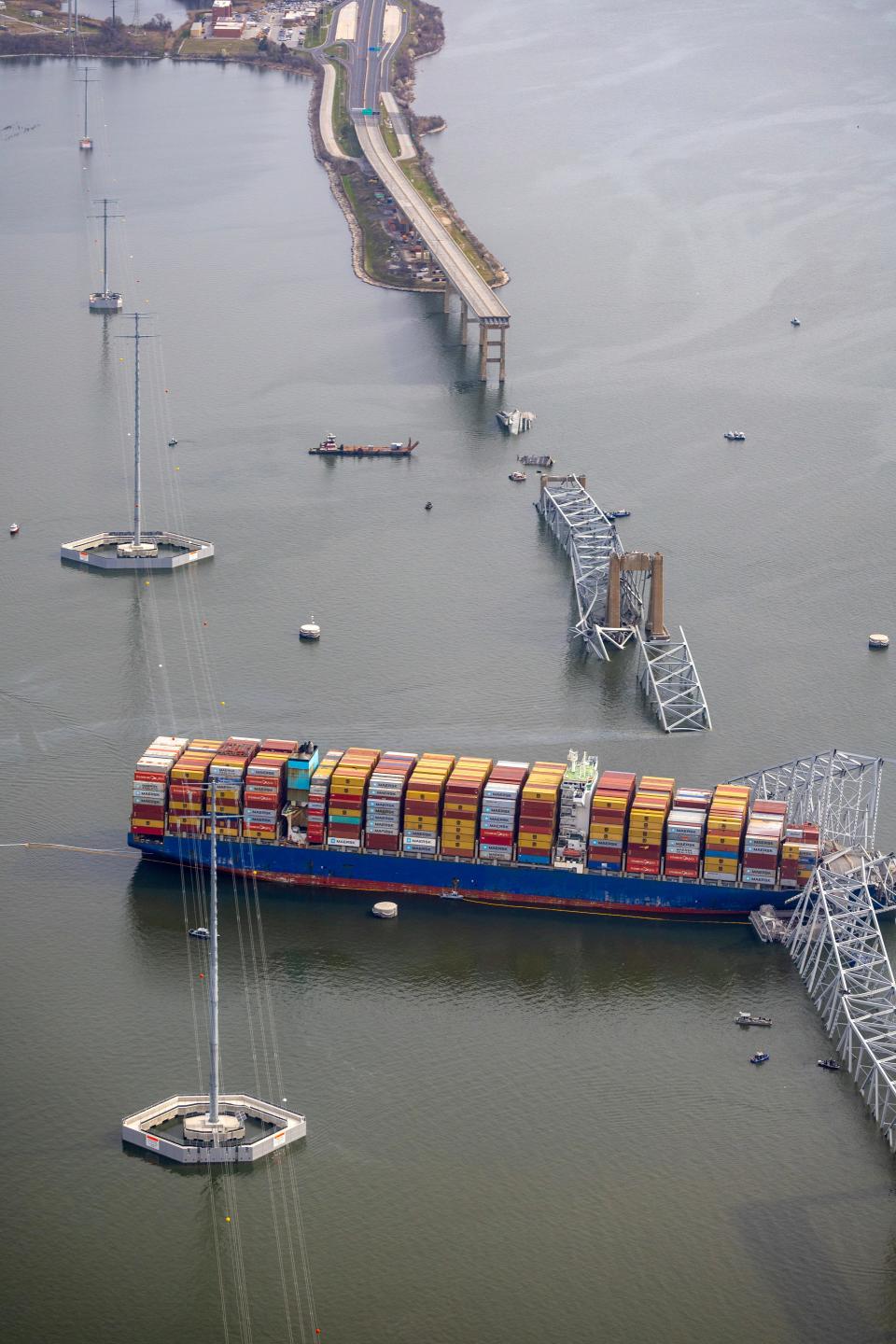 An aerial view of the cargo ship Dali in the wreckage of the Francis Scott Key Bridge in Baltimore.