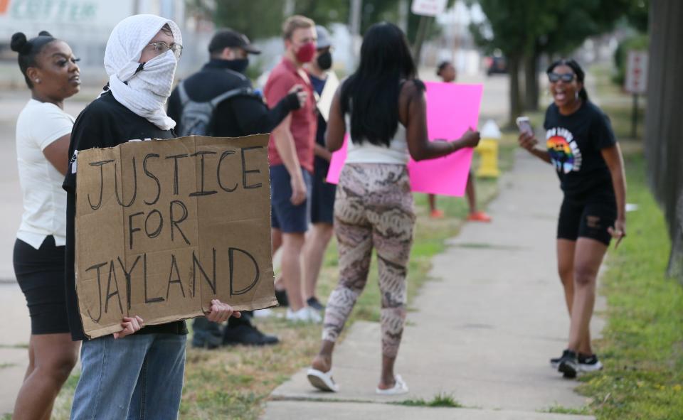 Protesters chant on Crosier Street near Summit County Jail during a protest Tuesday over the police shooting death of Jayland Walker and the subsequent arrests of protesters.