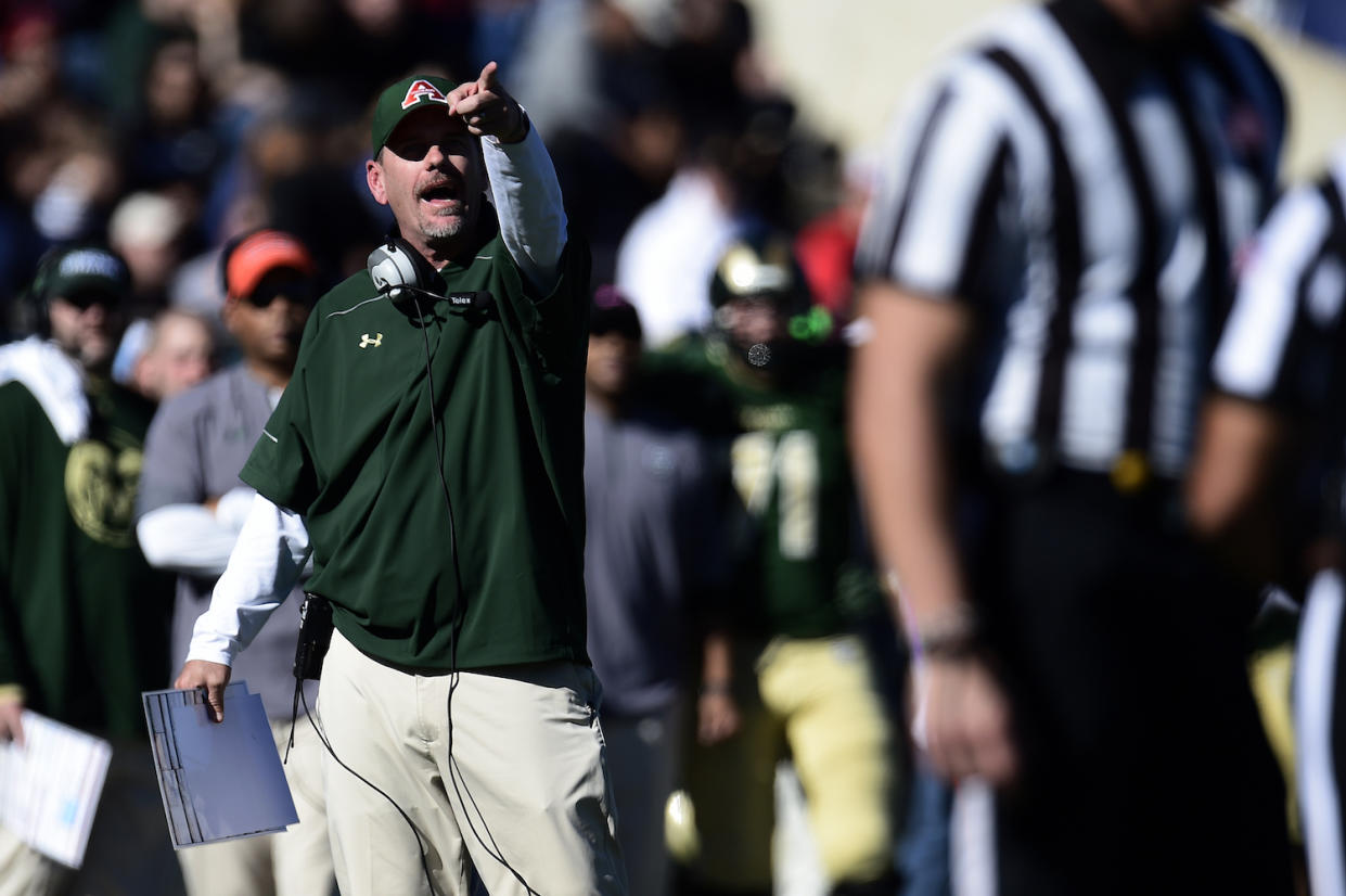 FORT COLLINS, CO - OCTOBER 31: Head coach Mike Bobo of the Colorado State Rams argues for the retention of a lost fumble under review against the San Diego State Aztecs during the first half of play. The Colorado State Rams hosted the San Diego State Aztecs at Sonny Lubick Field at Hughes Stadium on Saturday, October 31, 2015. (Photo by AAron Ontiveroz/The Denver Post via Getty Images)