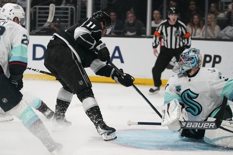 Kings center Anze Kopitar scores against Seattle Kraken goaltender Philipp Grubauer.