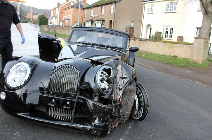 Oh dear: The handmade 4.8-litre V8 roadster was a write-off (SWNS) 