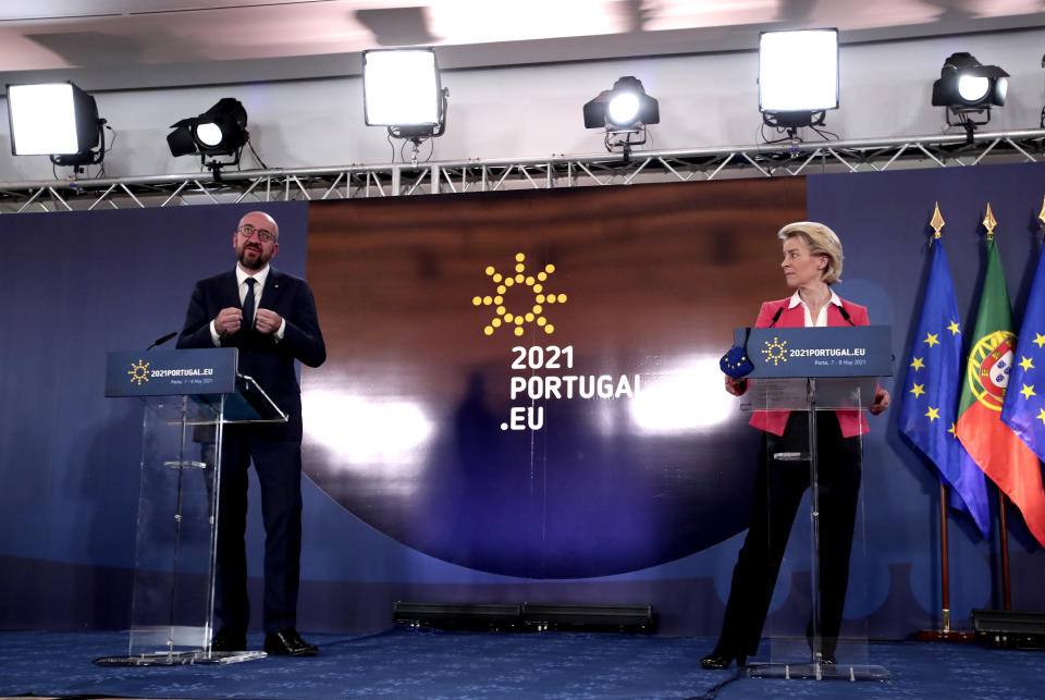 European Commission President Ursula von der Leyen, right, and European Council President Charles Michel address a media conference at an EU summit in Porto, Portugal, Saturday, May 8, 2021. On Saturday, EU leaders held an online summit with India's Prime Minister Narendra Modi, covering trade, climate change and help with India's COVID-19 surge. (AP Photo/Luis Vieira)