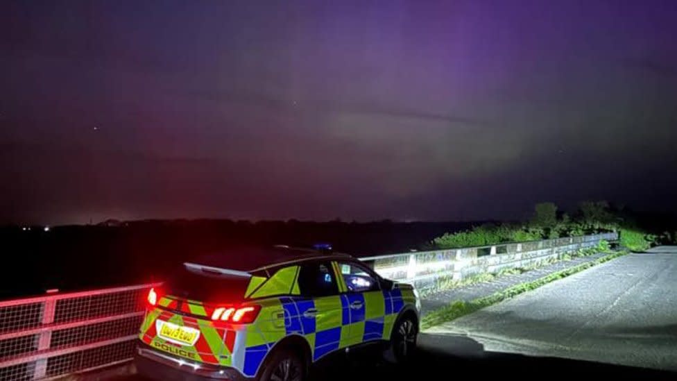 Police car and Northern Lights