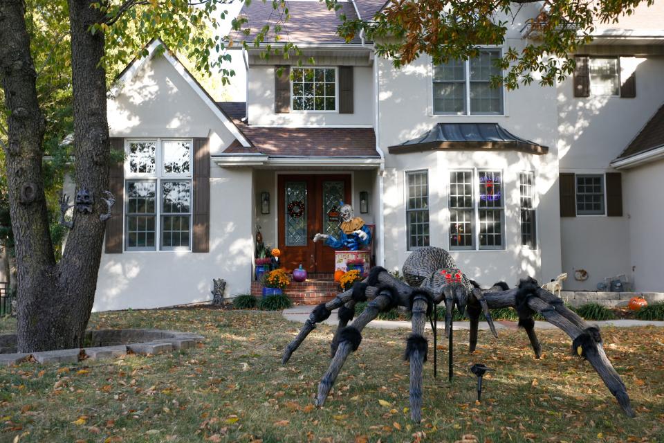 A large spider decoration sits in the front lawn of 2118 S. Forrest Heights Ave. on Friday, Oct. 14, 2022.